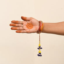 Load image into Gallery viewer, Yellow-Blue Phundi Handcrafted Lumba Rakhi
