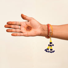 Load image into Gallery viewer, Yellow-Blue Phundi Handcrafted Lumba Rakhi
